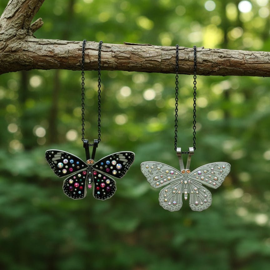 Butterfly-shaped pendants hanging from a branch with a forest background